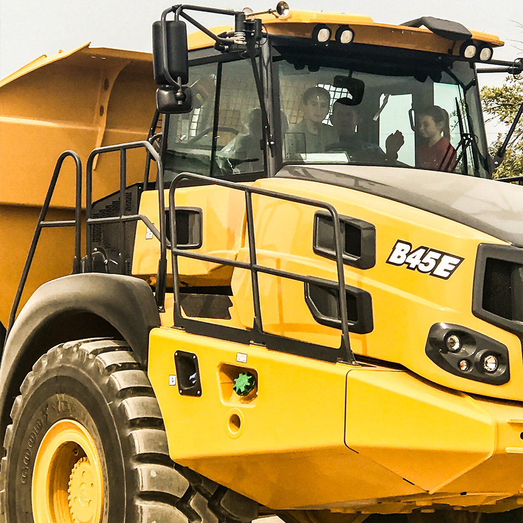 Kids Helping Kids in a Bell Truck
